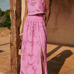 Pink lace sleeveless crop top and gathered midi skirt set with long hem slit