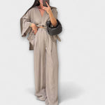 Beige layered V-neck top and wide-leg pants set with drawstring waist