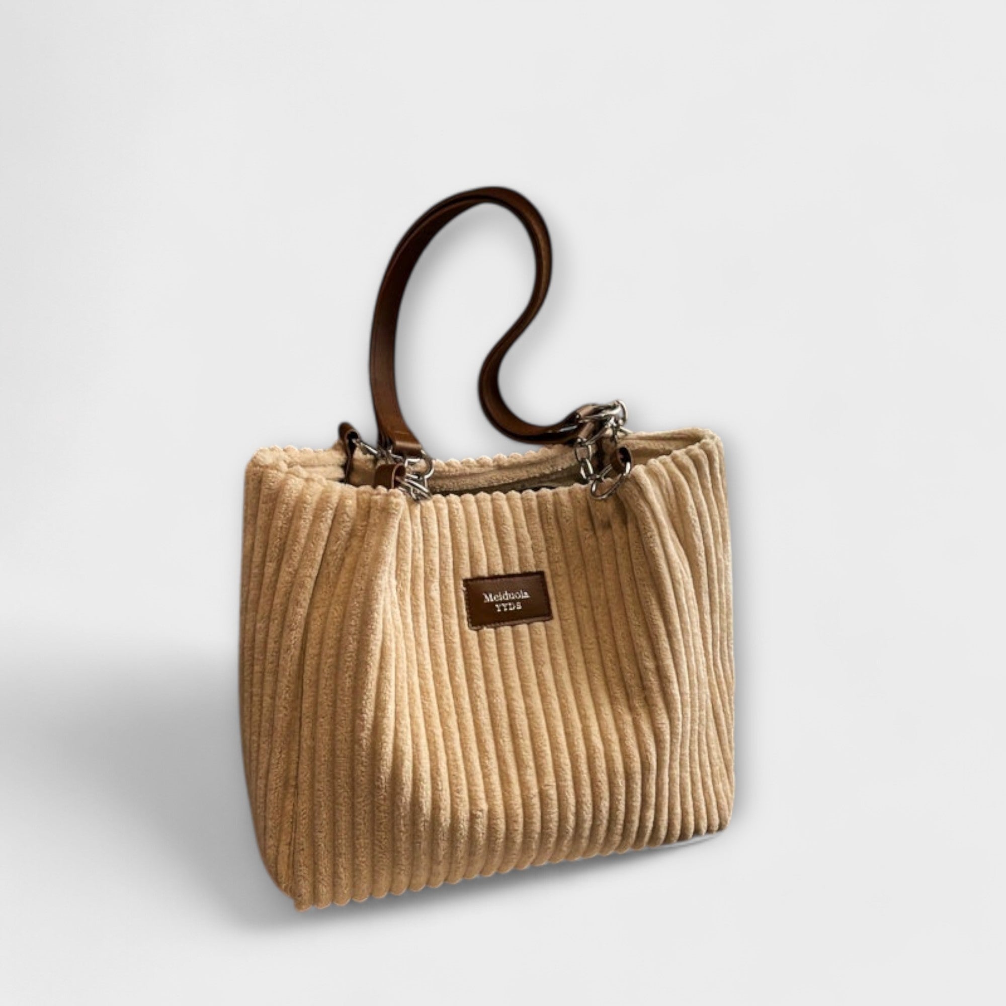 Beige ribbed shoulder bag with leather strap and front label