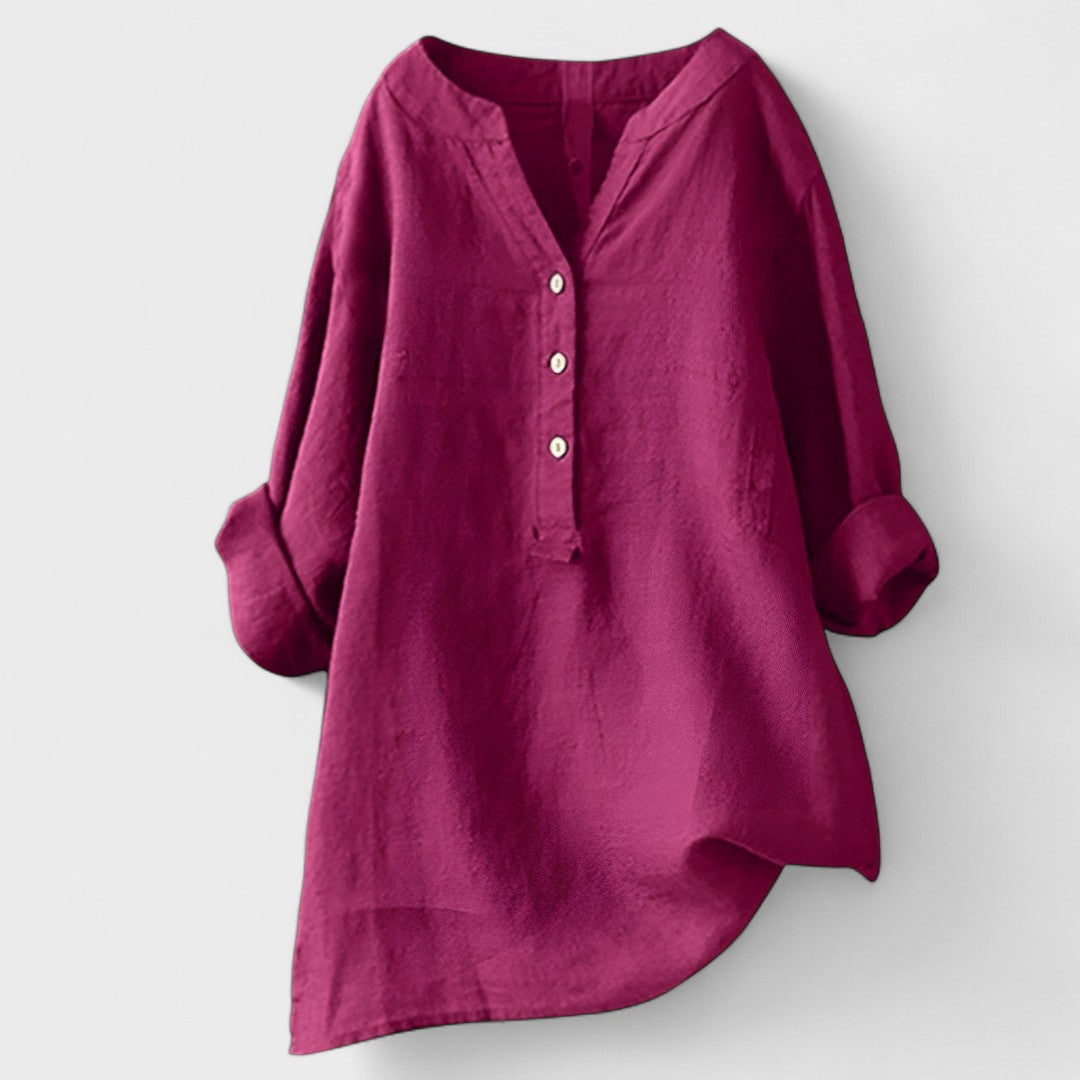 Fuchsia comfort shirt with V-neck, button front, and 3/4 cuffed sleeves