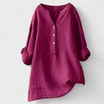 Fuchsia comfort shirt with V-neck, button front, and 3/4 cuffed sleeves