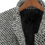 Black-and-white textured coat collar and inner lining close-up