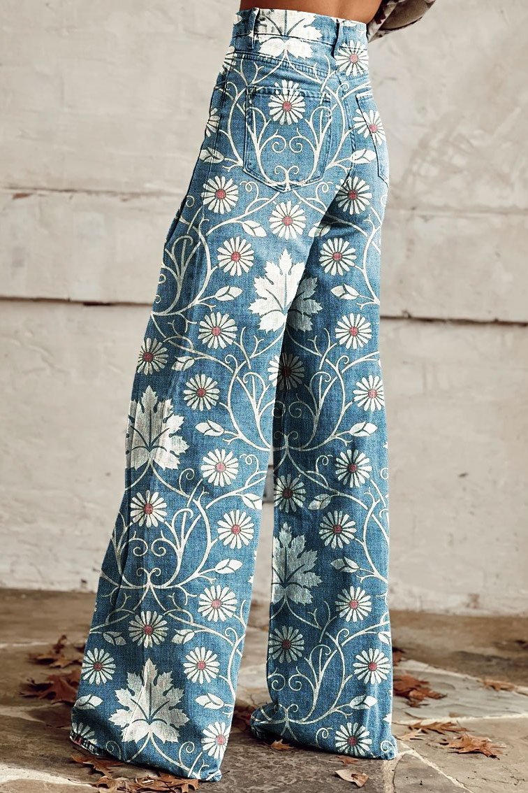 Wide-leg boho trousers with blue fabric and white daisy floral vine pattern