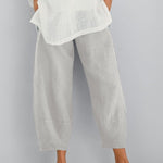 Off-white lightweight summer pants, relaxed fit with cropped ankle cuffs