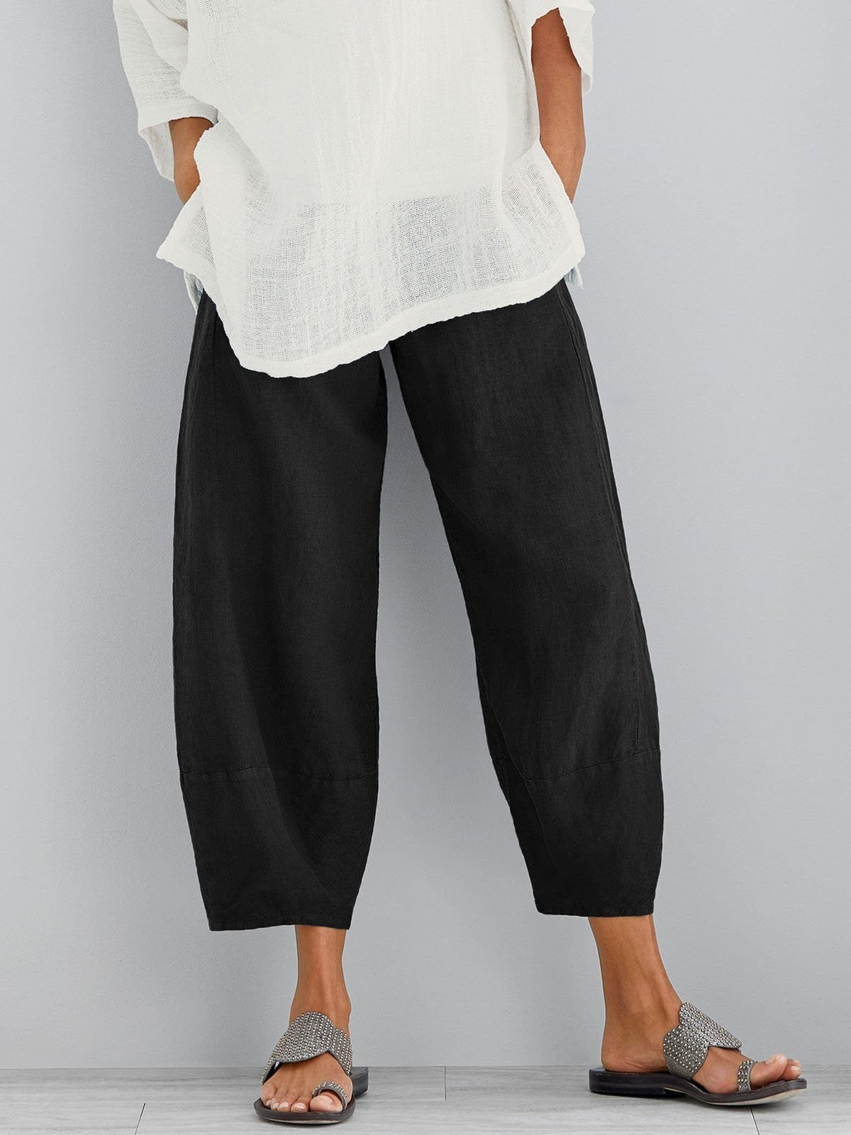 Black lightweight summer pants, loose tapered legs with cropped ankle cuffs