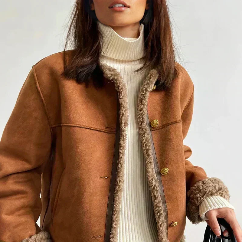 Brown jacket with sherpa-lined placket and gold buttons; warm high collar