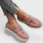 Nefeli dusty rose suede moccasins with tie tassel detail, on feet