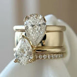Vintage double-drop zirconia ring with pear-cut stones and pavé band
