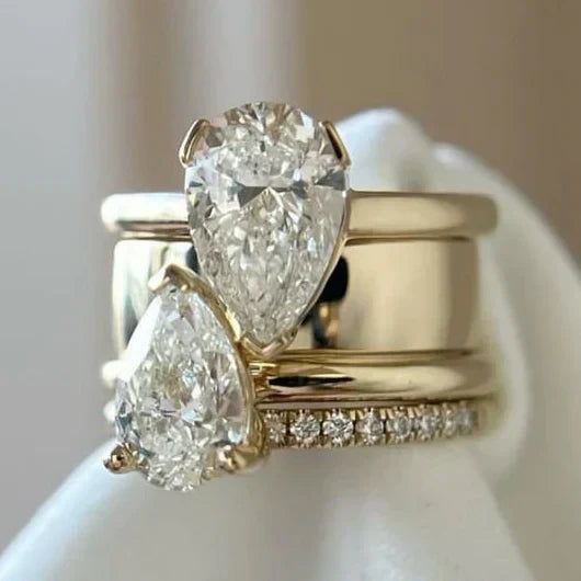 Vintage double-drop zirconia ring with pear-cut stones and pavé band