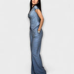 Blue sleeveless V-neck top and wide-leg pants set, side profile