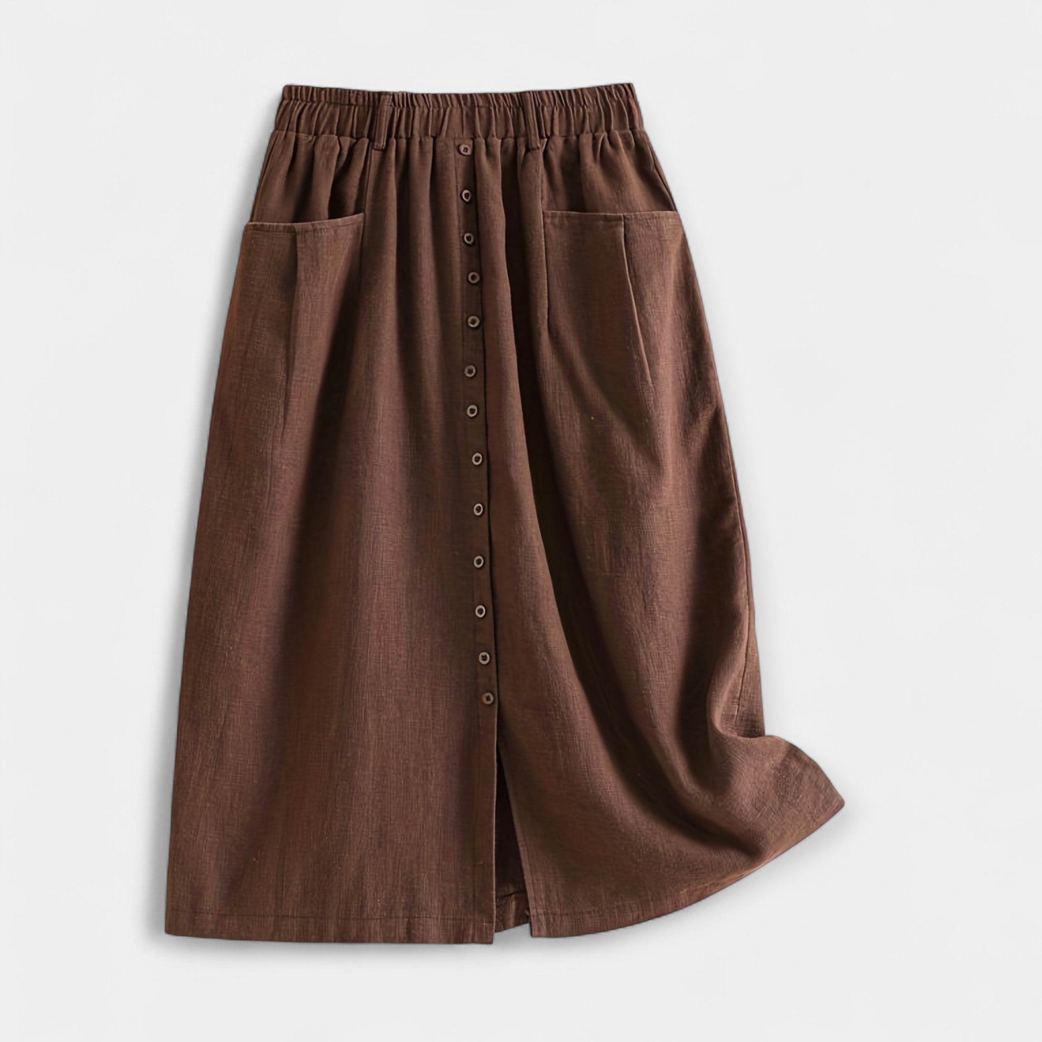 Brown midi skirt with elastic waistband, front buttons, and side pockets.