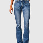 High-waisted slim-fit blue jeans with button fly, belt loops, five pockets