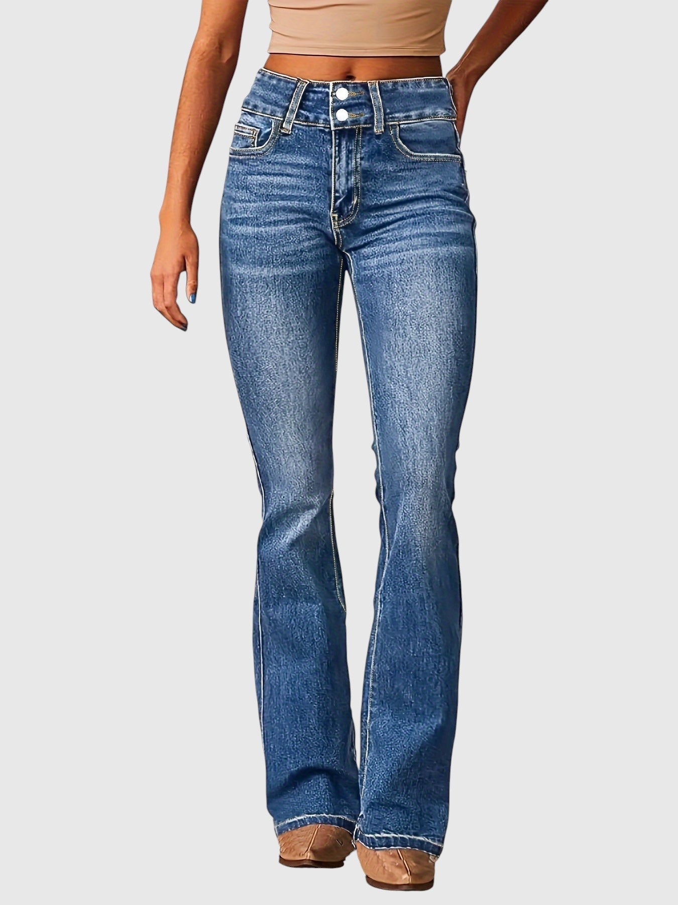 High-waisted slim-fit blue jeans with button fly, belt loops, five pockets