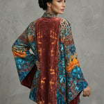 Boho artistic jacket, back view with rust center and teal multicolor print, wide kimono sleeves