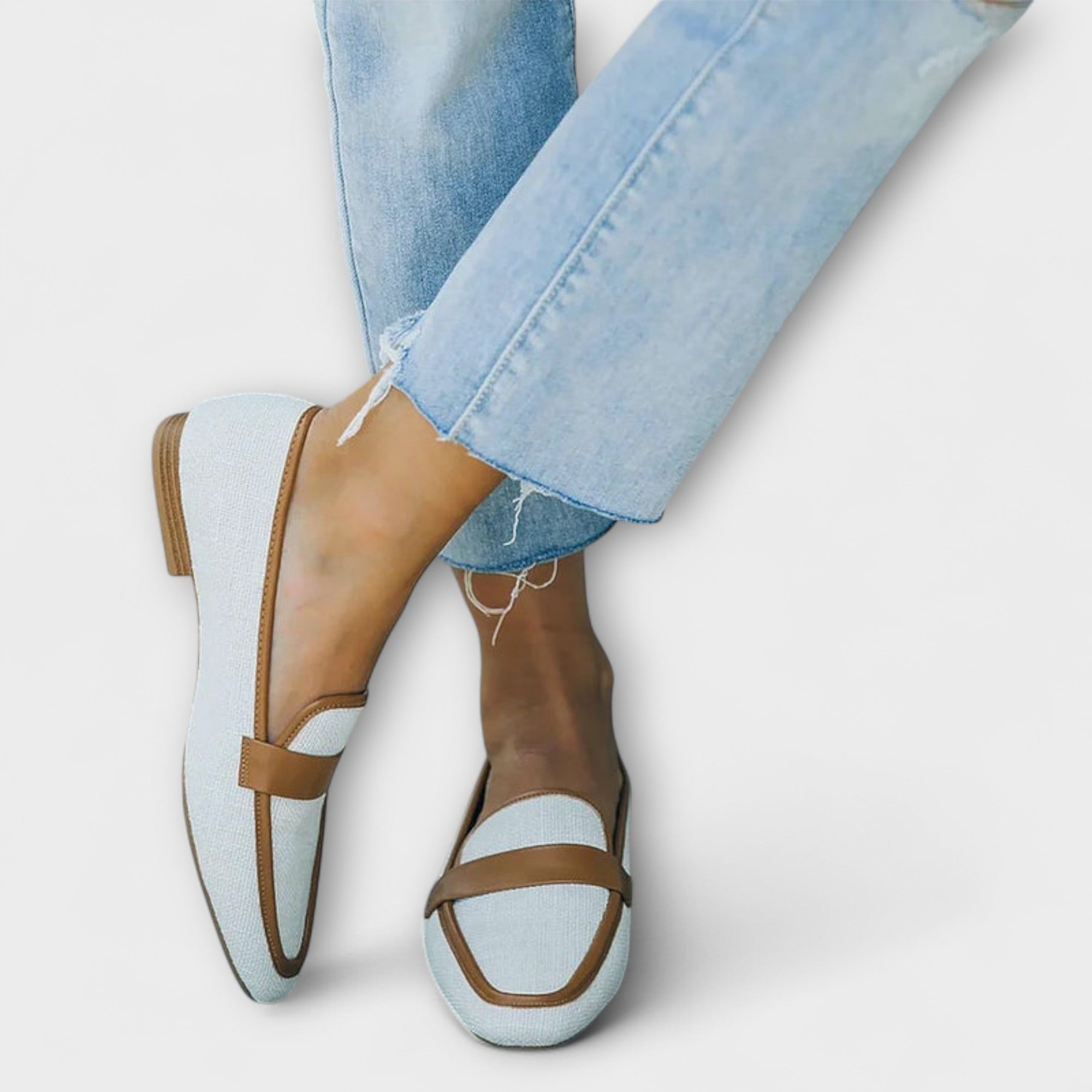 Retro moccasin loafers with tan trim and light blue suede uppers