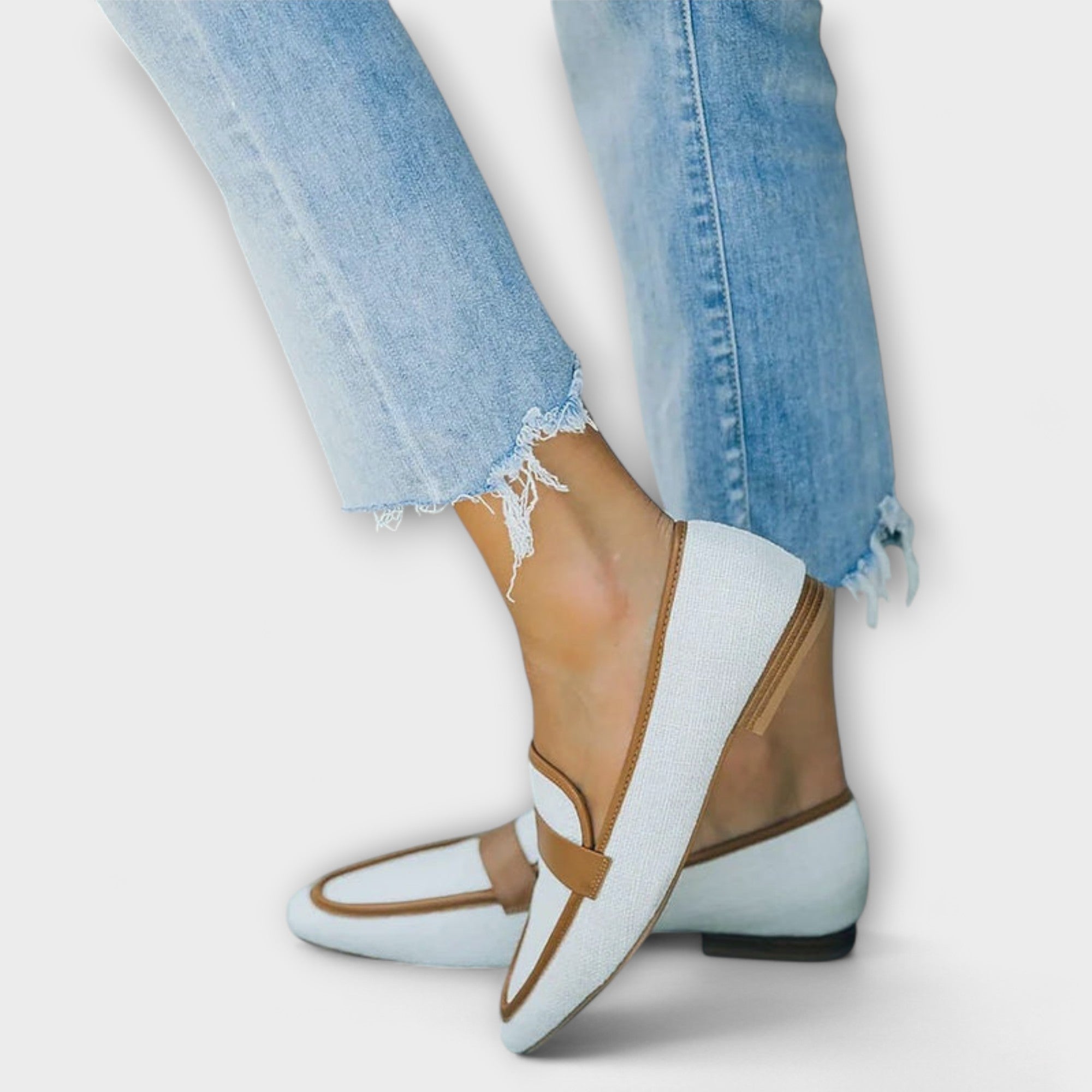 Retro moccasin loafers with tan trim, light blue upper, low heel