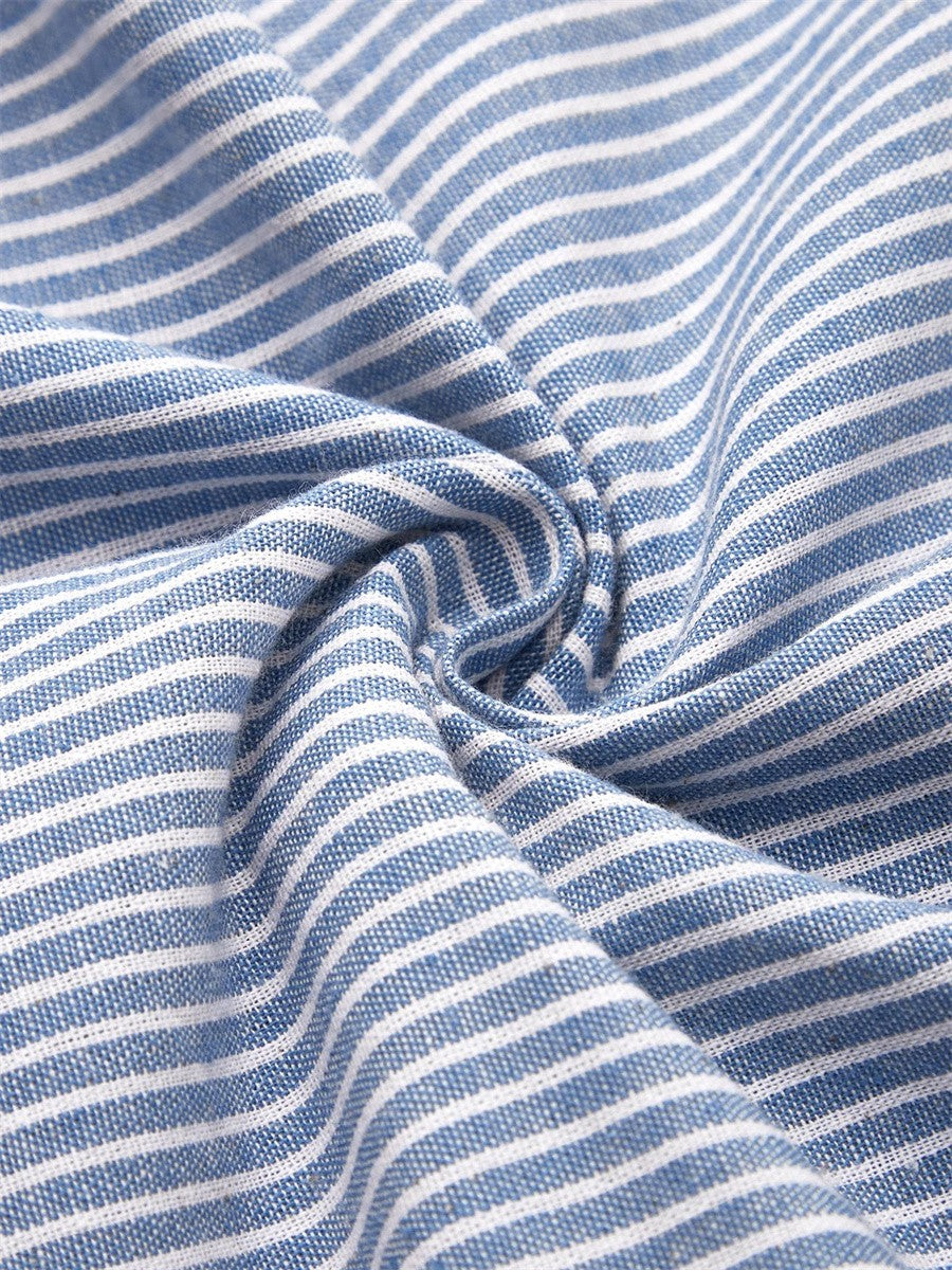 Close-up of blue and white striped knit fabric with gathered texture