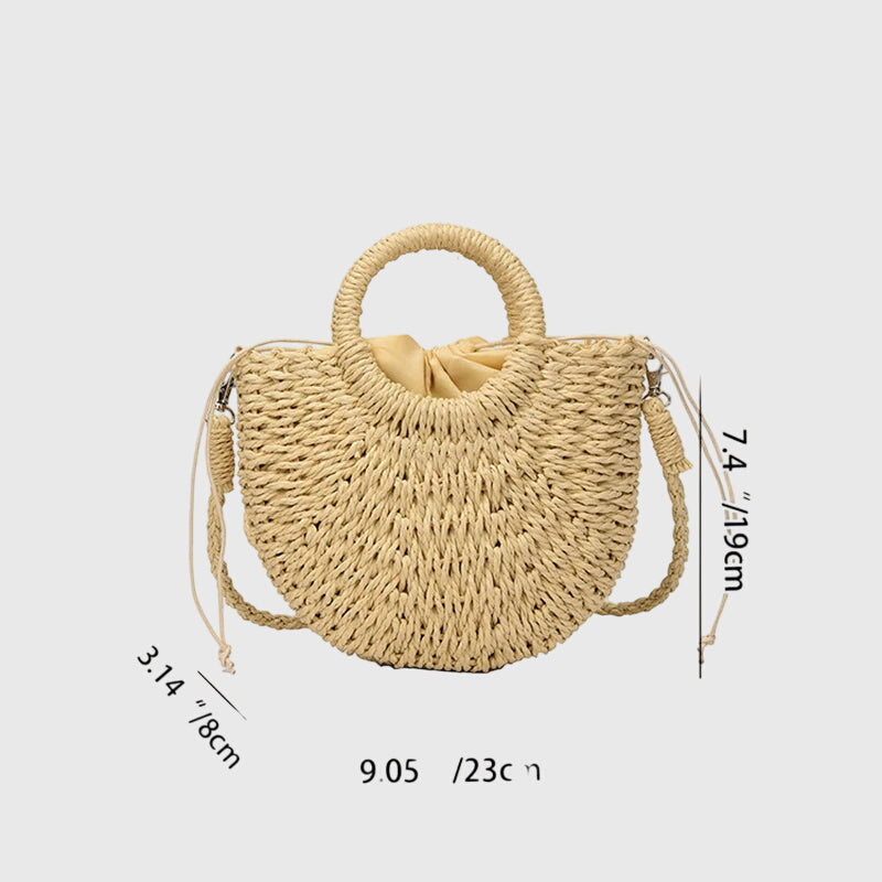 Beige round-woven straw shoulder bag with ring handles and crossbody strap.
