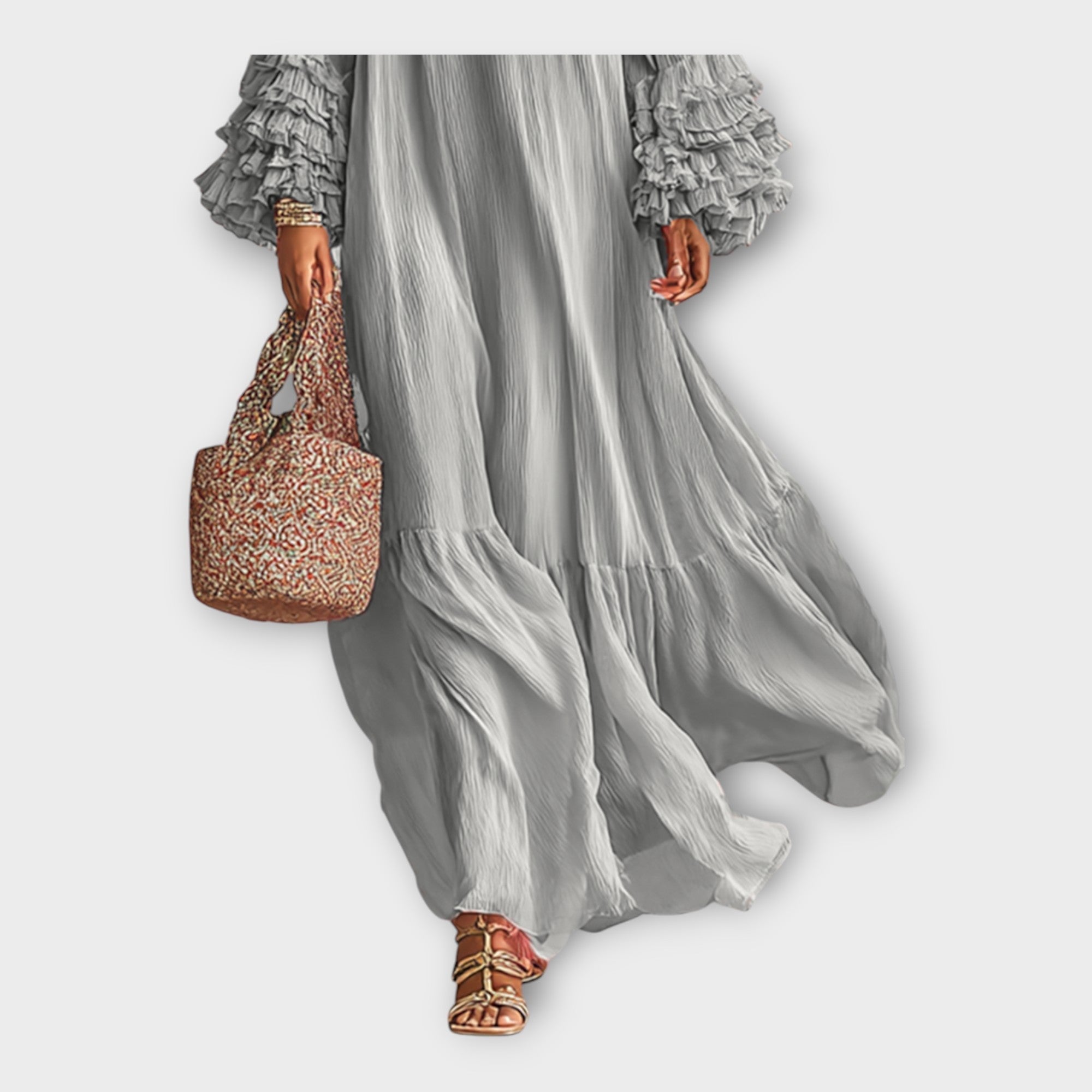 Gray maxi dress detail: tiered ruffle sleeves and flowing layered skirt hem