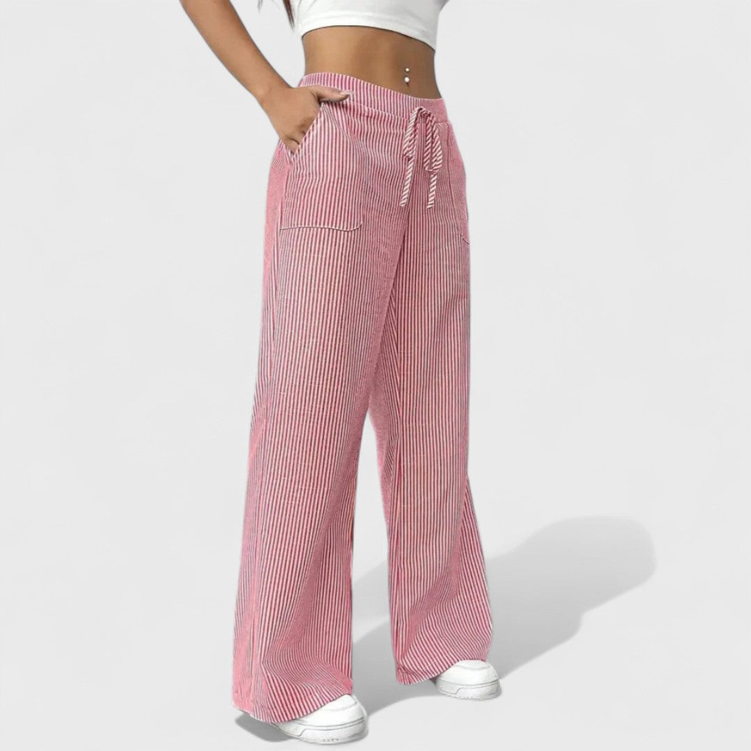 Pink striped wide-leg pants with elastic waistband, drawstring tie, and side pockets