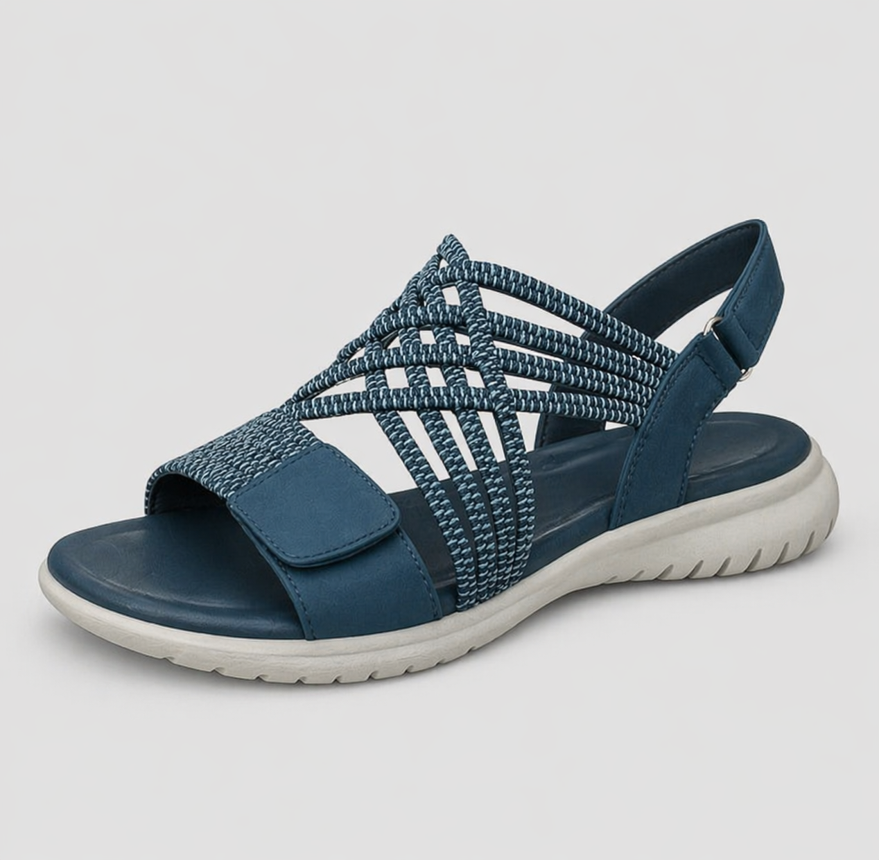 Orthopedic sandal in blue with open toe, woven upper straps, and padded footbed.