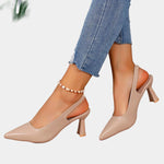 Beige orthopedic pointed-toe heels with mid block heel and back sling strap
