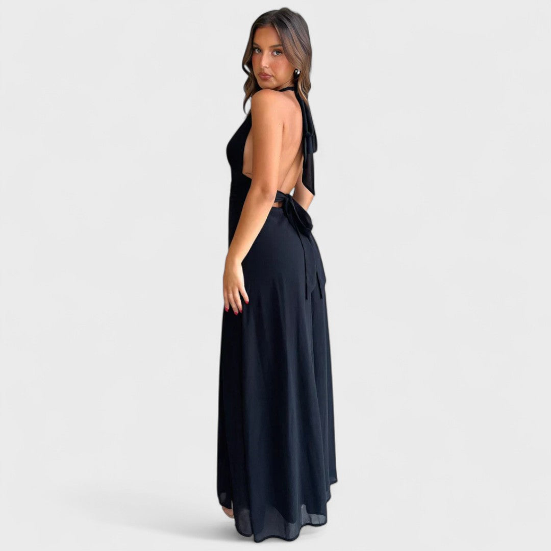 Navy long halter dress with V-neckline and flowing side slit