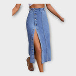 Light blue denim maxi skirt close-up: waistband buttons and front slit