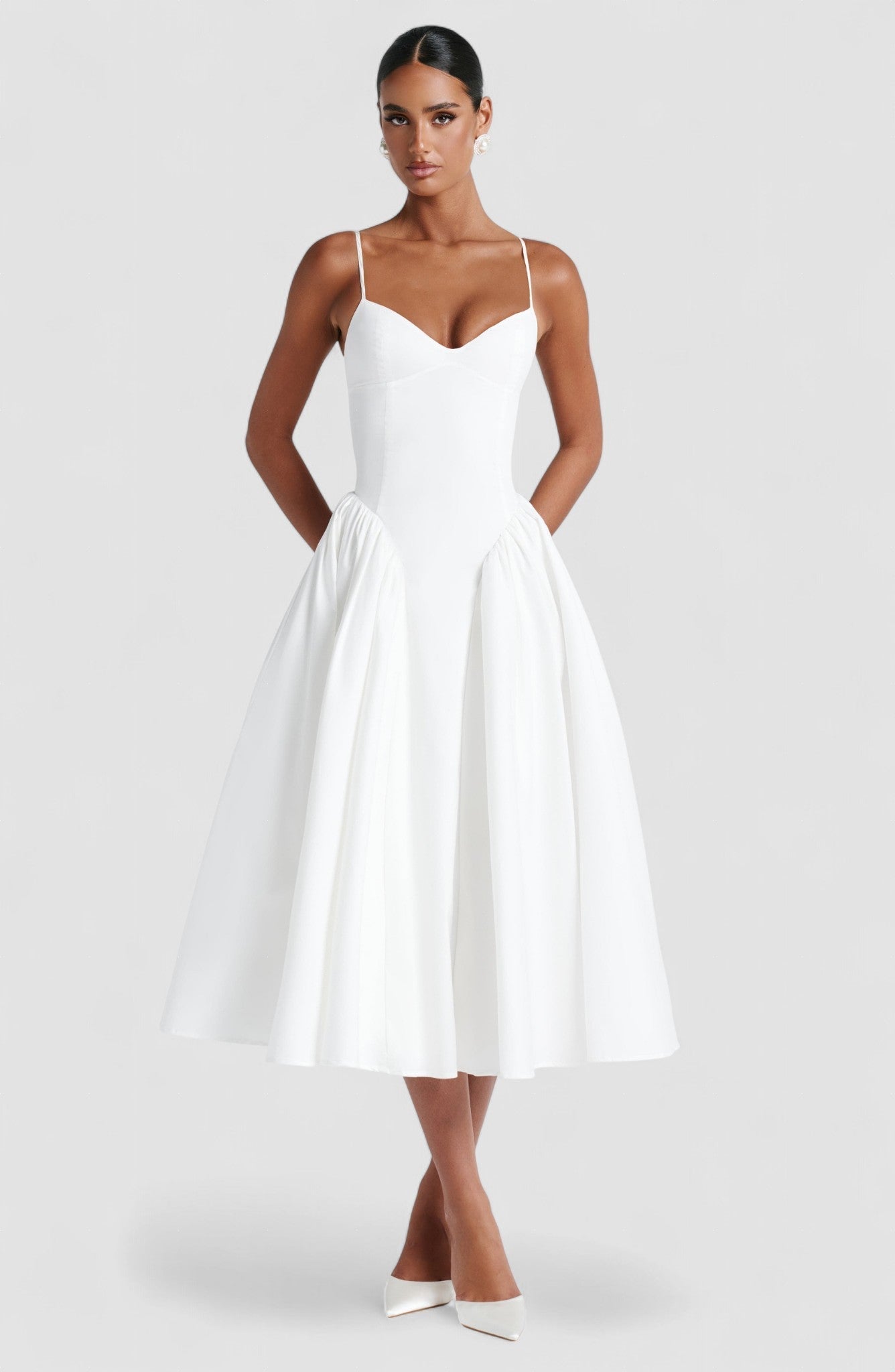 Women’s white midi dress with fitted bodice and full gathered skirt