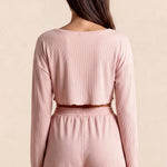Women’s rose pajama set from back: long-sleeve cropped top with elastic drawstring shorts