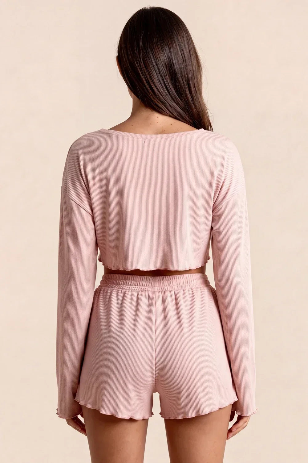Women’s rose pajama set from back: long-sleeve cropped top with elastic drawstring shorts