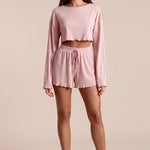 Women’s rose pajama set: long-sleeve cropped top and short elastic-waist drawstring bottom