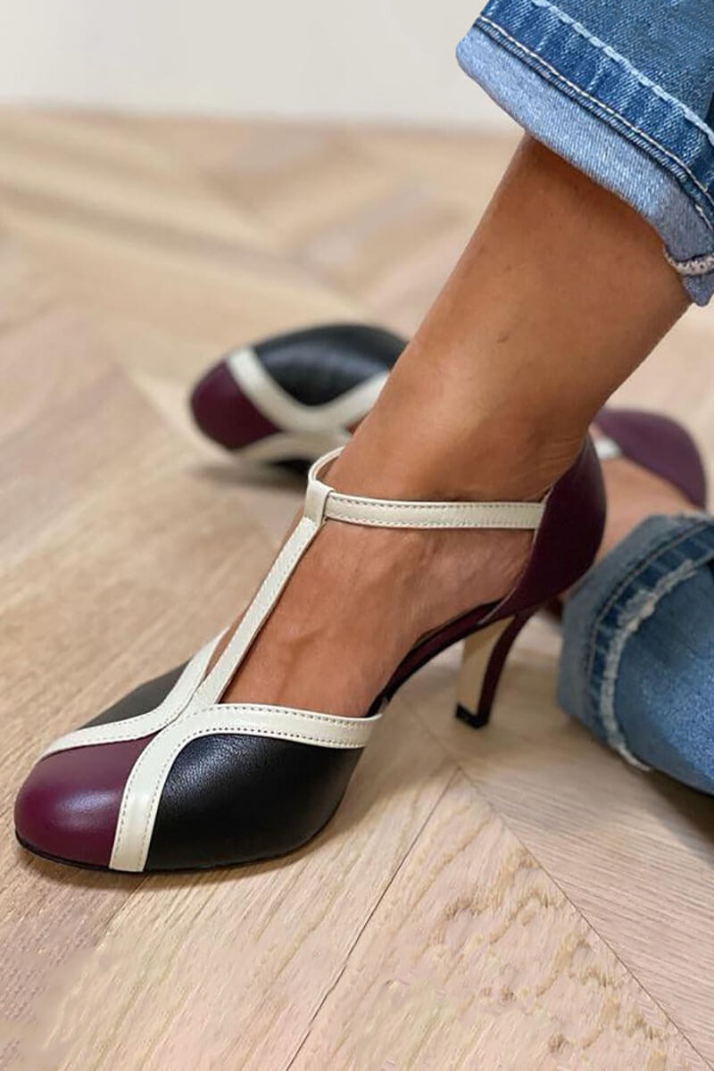 Retro T-bar pumps with white straps, dark toe, and slim high heel