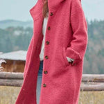 Long pink hooded coat with button front and side pockets