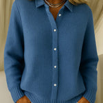 Light blue knit cardigan with collared button placket and ribbed hem and cuffs.