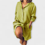 Loose linen shirt-dress, lime green, button-front, point collar, long sleeves, relaxed fit.