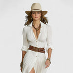 White long linen wrap dress with V-neck button placket, gathered waist, and slit