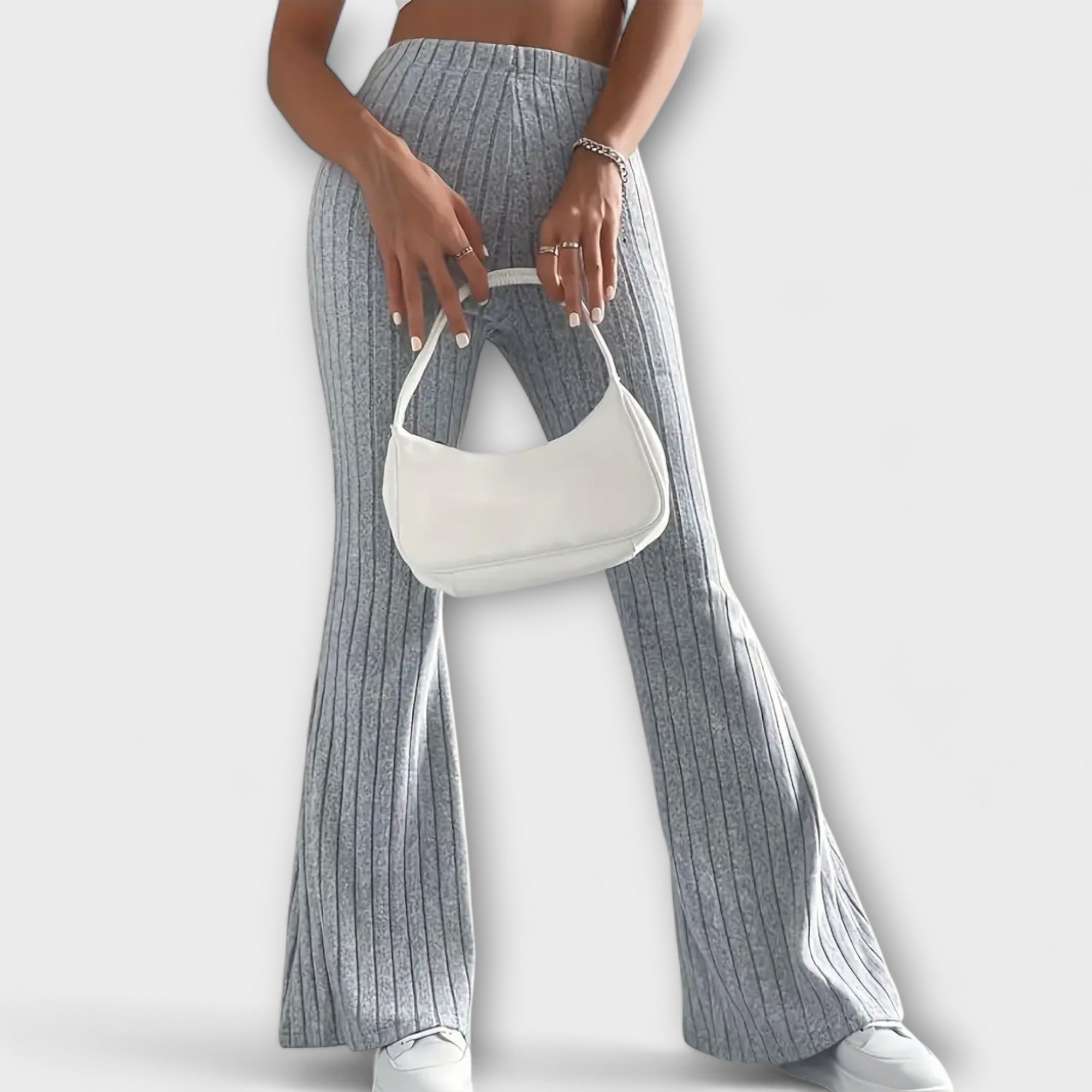Grey ribbed knit flared pants with high rise and subtle vertical texture