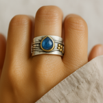 Vintage blue sapphire sterling silver ring with oval blue stone and small gold bead accents