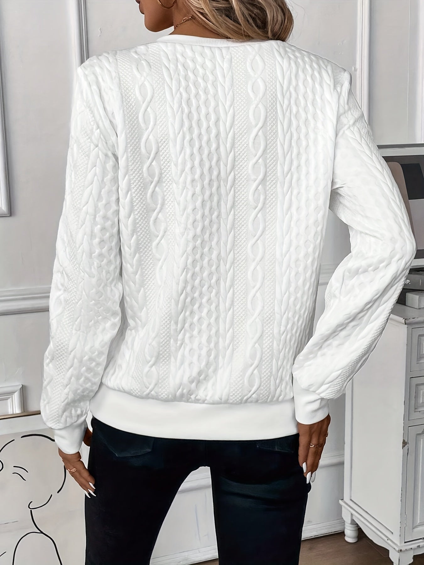 White cable-knit zip-front sweater, back view, long sleeves with textured braid pattern.