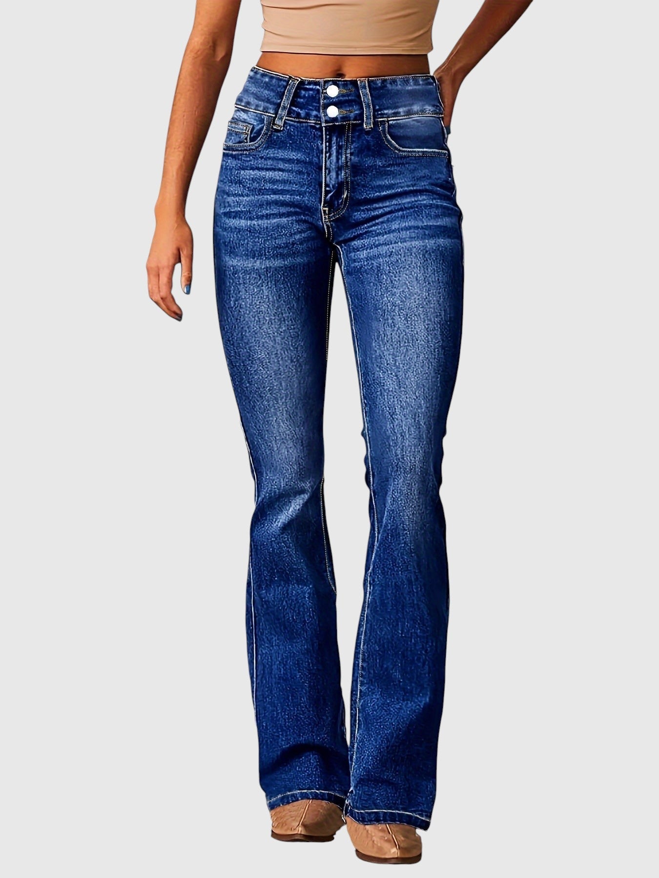 High-waisted slim-fit dark-blue jeans with button fly and five-pocket styling