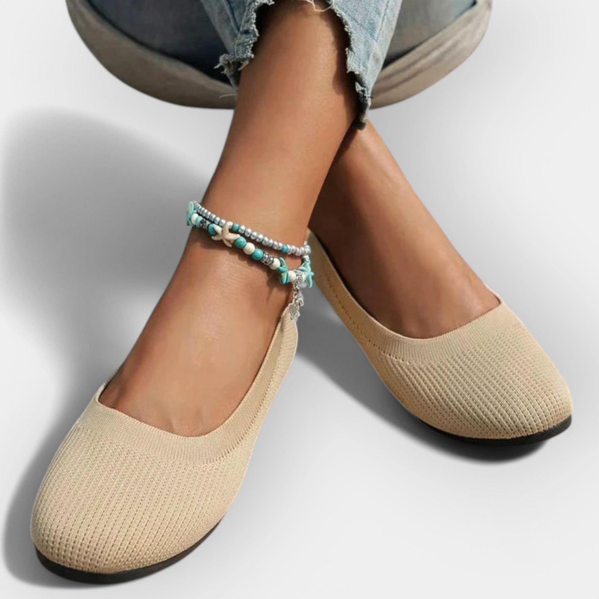 Beige knit slip-on ballet flats with rounded toe and flat sole