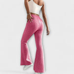 Pink ribbed knit high-waist flare pants with straight-to-bell silhouette