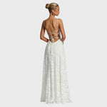 White maxi dress with crisscross open back and tie, spaghetti straps