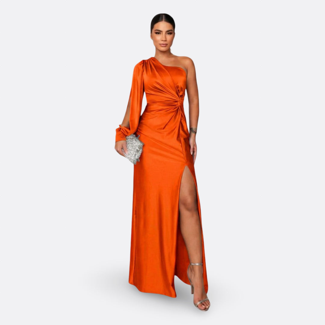 Orange one-shoulder maxi dress with draped sleeve and side slit, ruched waist
