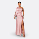 Blush pink one-shoulder maxi dress with draped sleeve and side slit, ruched waist