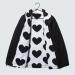 Black reversible winter jacket with white heart fleece and full front zip