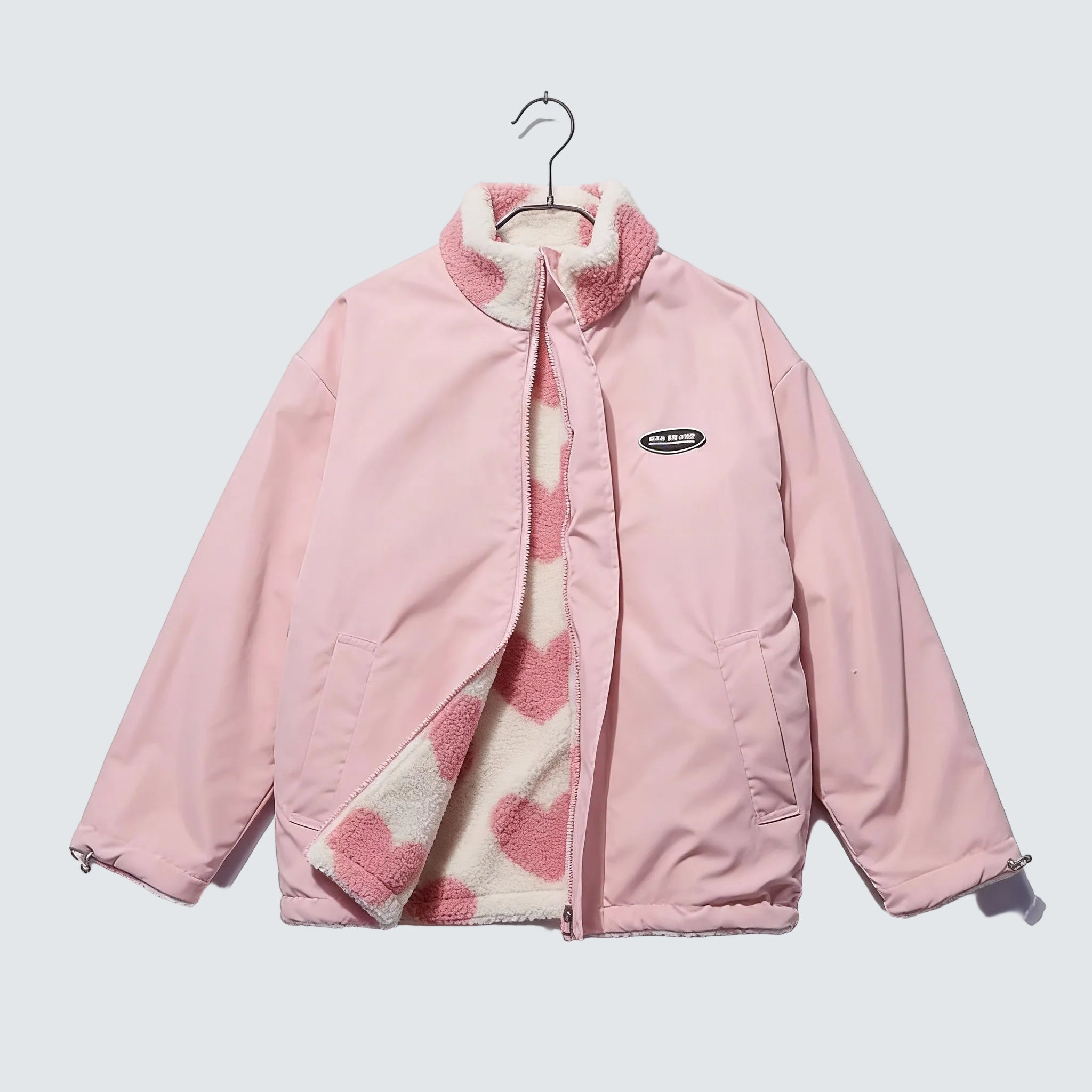 Pink reversible winter jacket with heart-fleece lining and full front zip