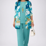 Three-piece blue set with printed open-front cardigan, sleeveless top, and wide-leg pants