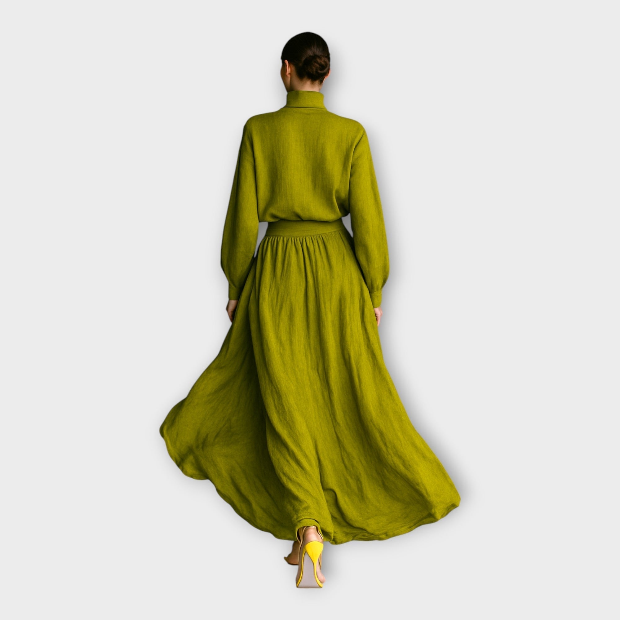 Green knit turtleneck sweater and flowing maxi skirt set, back view